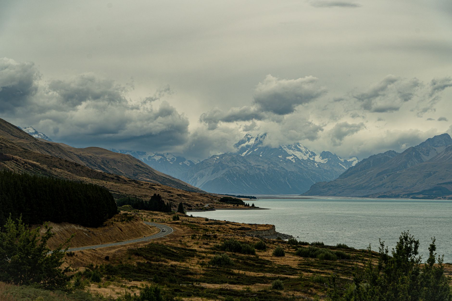 Campervan parked in scenic New Zealand wilderness